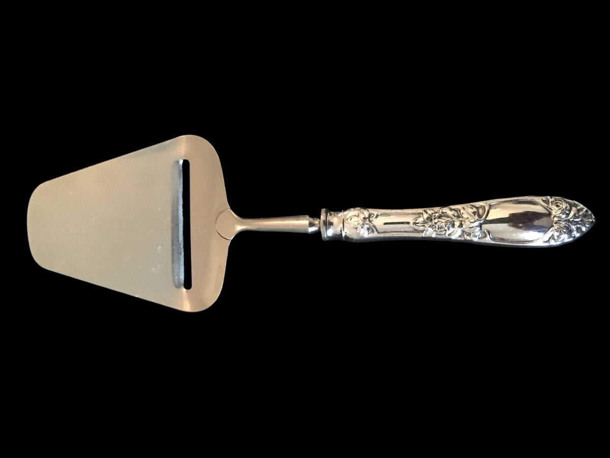 Opphøid Rose sølv ostehøvel 22.5 cm