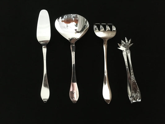 Opphøyd Rose sølv i 830s av Th Marthinsen