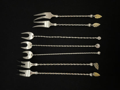 Festbord sølvbestikk koldt gaffel bakside