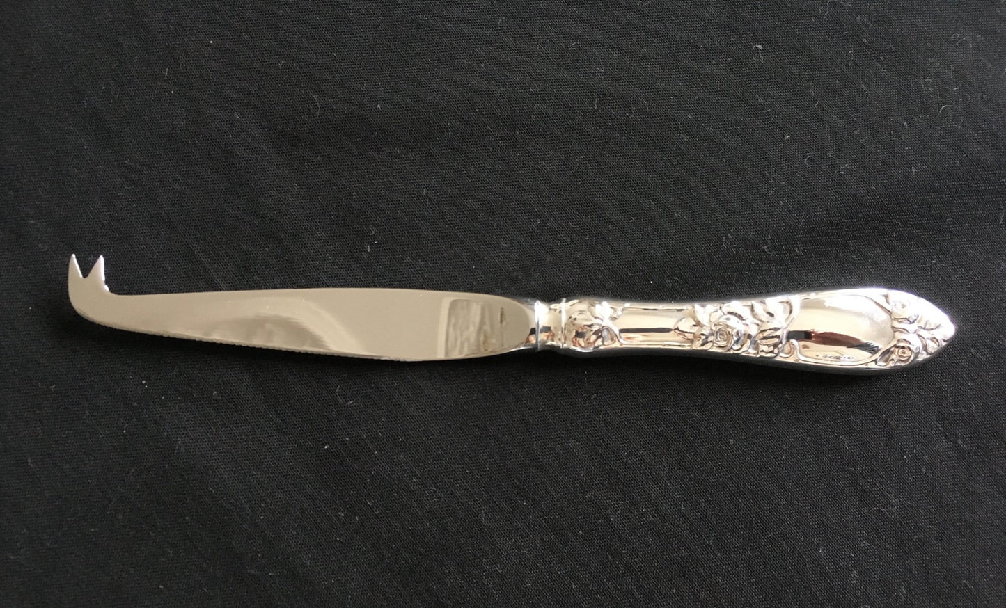 Raised Rose silver cheese grater and cheese knife in the 830s by Th Marthinsen