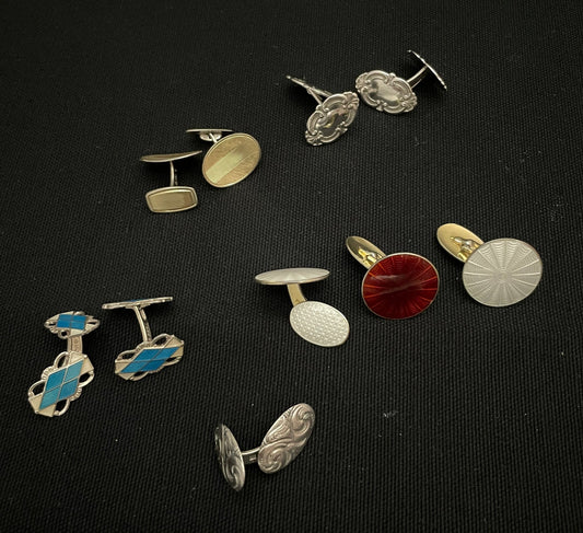 Masjettknapper i sølv i forskjellige farger 