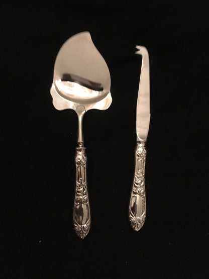 Raised Rose silver cheese grater and cheese knife in the 830s by Th Marthinsen