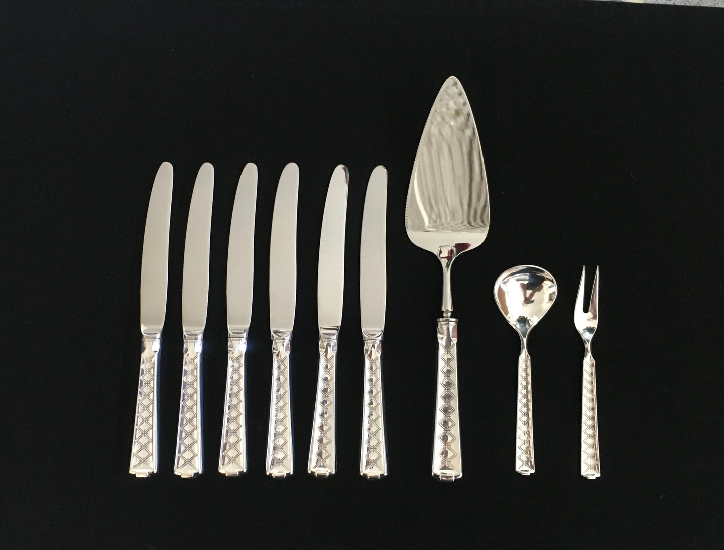 Silver cutlery in the pattern Tone. knives, pie spatula, cold fork, jam spoon and cheese grater in the 830s