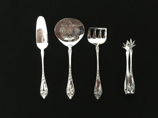 Raised Rose butter shovel, tomato shovel, sugar pincher and herring shovel in the 830s