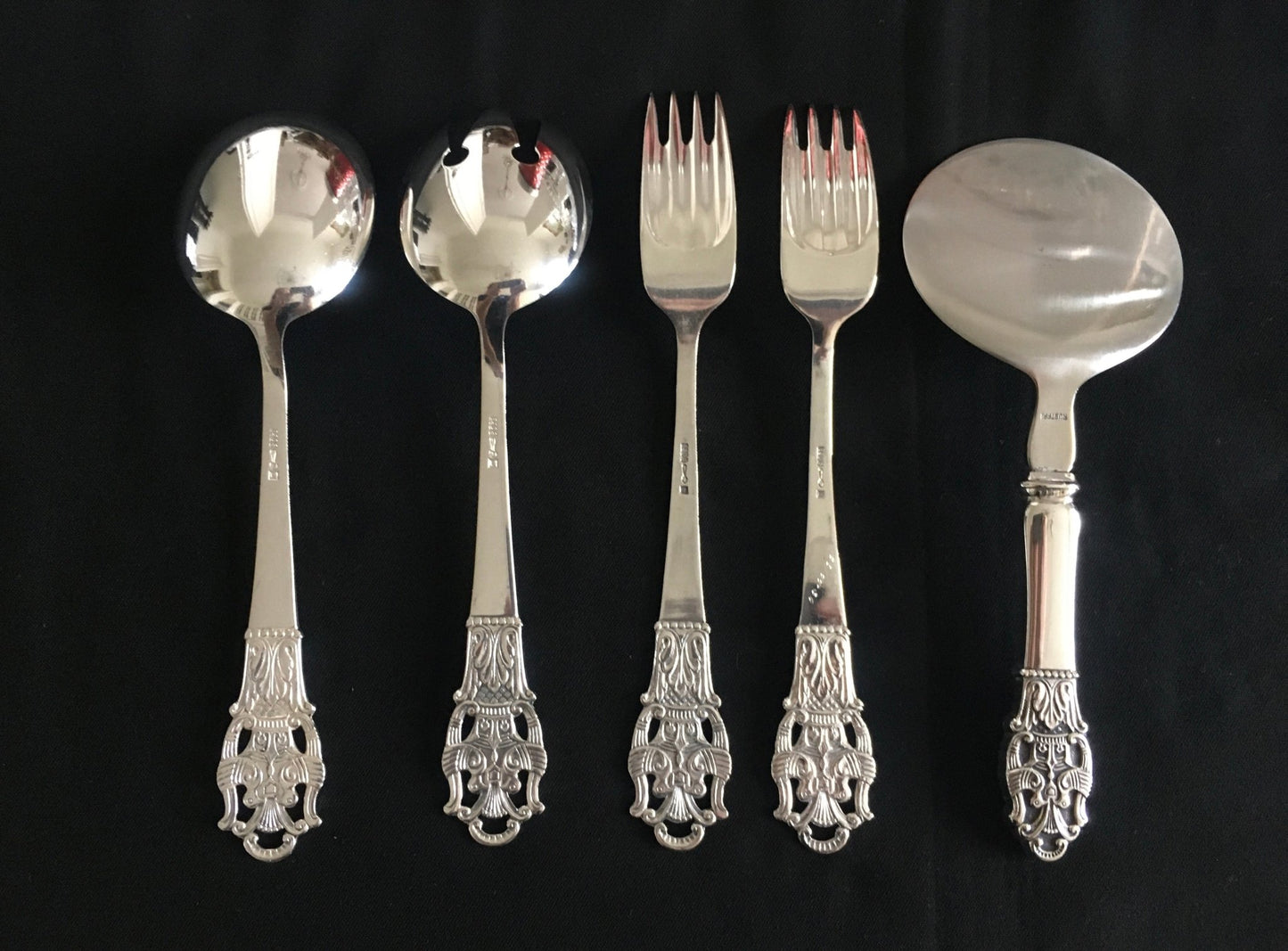 Diplomat silver salad cutlery and in various parts in the 830s by Nils Hansen silverware