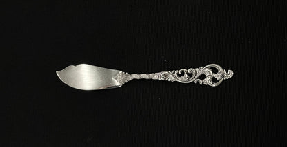 Double Rococo silver butter shovel and other parts in the 830s by Brødrene Lohne