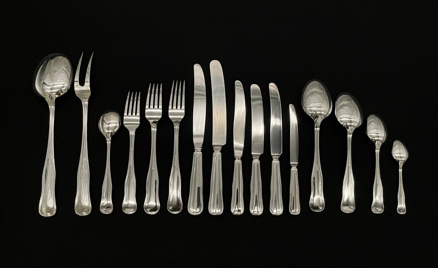 Fluted silver cutlery parts in the 830s by David Andersen