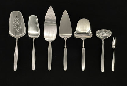 Are silver serving pieces in 830s by Tostrup