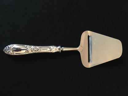 Raised Rose silver cheese grater and cheese knife in the 830s by Th Marthinsen